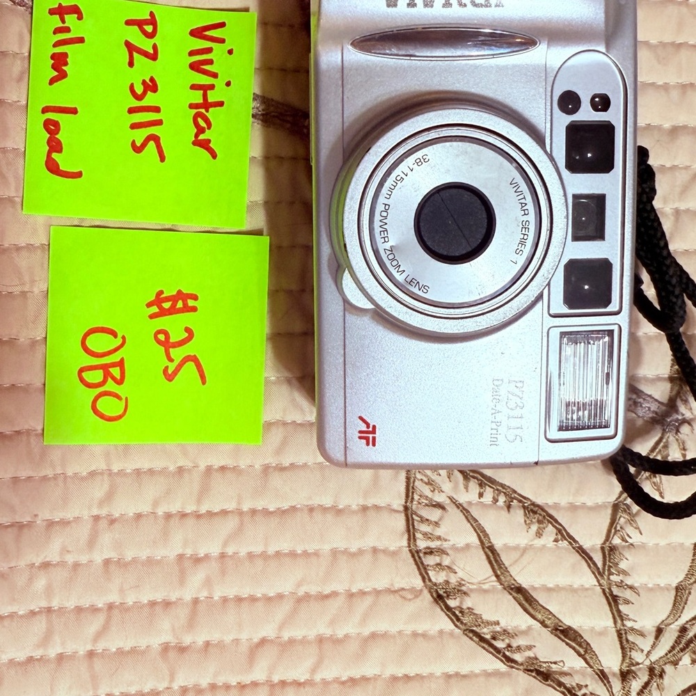 PZ3115 Silver Camera